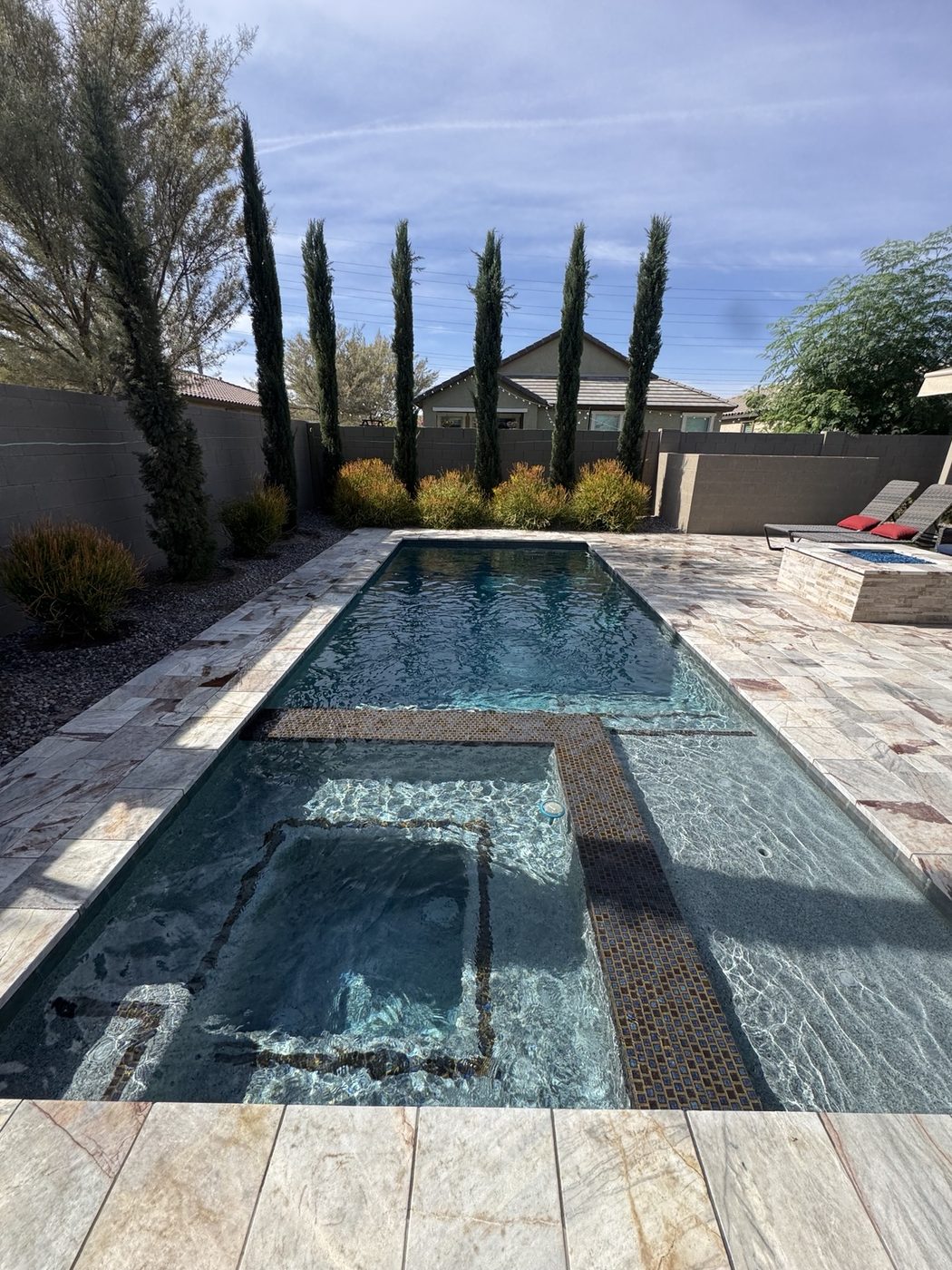 Premium backyard pool maintained by Cardwell Pool Care